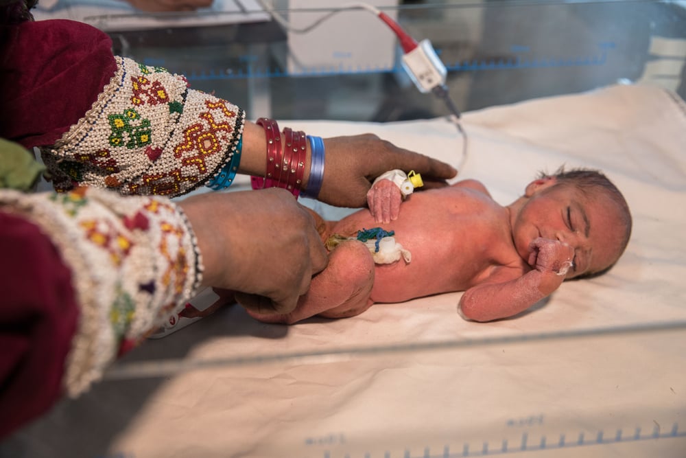 Neonatal Intensive Care<br> Aisha, three days old, is treated for sepsis at the neonatal intensive care unit at the Boost hospital.