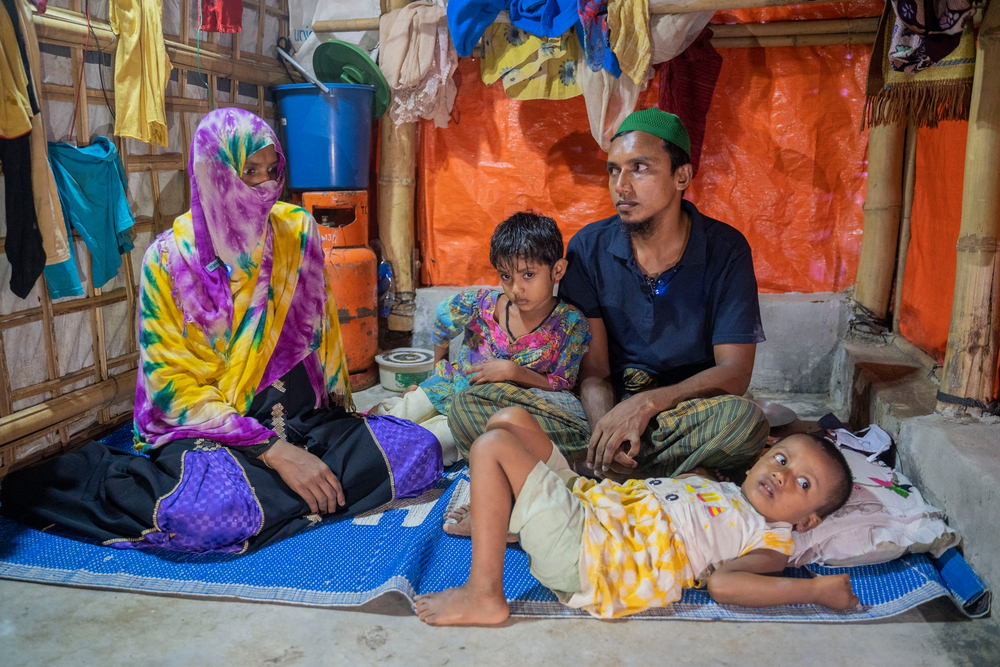 Nabi Ullah, 25 years old, fled to Bangladesh with his wife Nasima Khatun and children in 2017. Not everyone in the group they escaped with survived the journey. Now, five years later, Nabi Ullah and his wife reflect on what it would take for them to be able to return to Myanmar. © Saikat Mojumder/MSF
