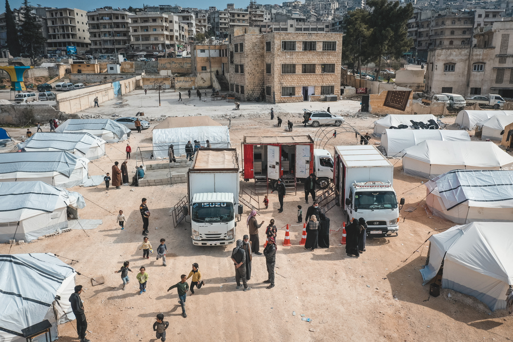 An aerial view of MSF’s distribution of relief items to a reception centre hosting families displaced by the earthquake which struck Syria and Türkiye on 6 February. © OMAR HAJ KADOUR