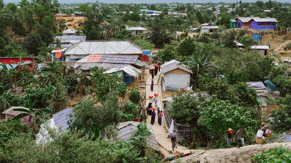 Myanmar's mountain can been seen in the background, reminding the Rohingya of home.  © Victor Caringal/MSF
